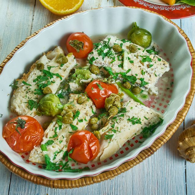 Treska pečená s rajčaty a bylinkovým máslem | foto: Fotobanka Profimedia