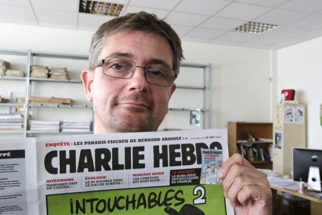 Šéfredaktor francouzského časopisu Charlie Hebdo Stéphane Charbonnier,  který zahynul během středečního útoku. Všechny evropské muslimské komunity útok odsoudily | foto: Michel Euler,  ČTK